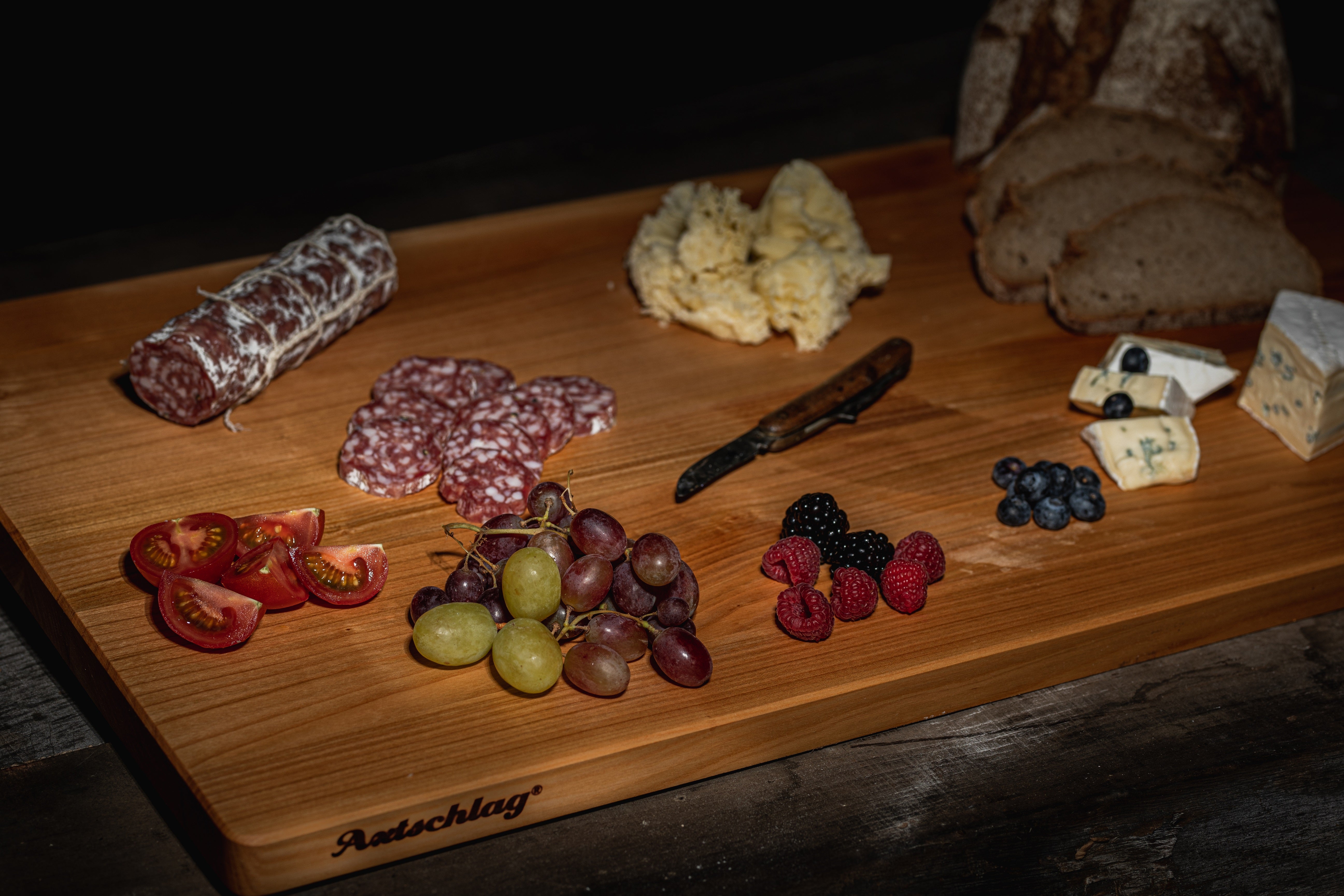 axtschlag-schneidebrett-xxl-kirschholz-70x40-cm-anrichtbrett image 4
